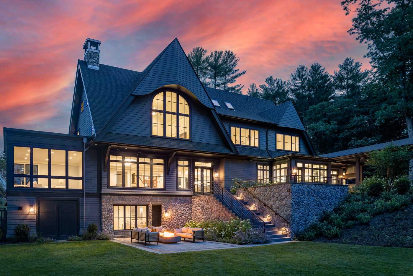 Dusk view of custom designed shingle style home Metrowest, MA 